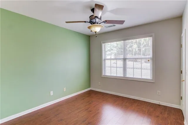 a spacious bathroom with a double vanity sink mirror and