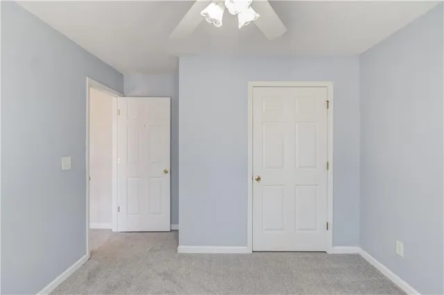 a big house with a big yard and more windows