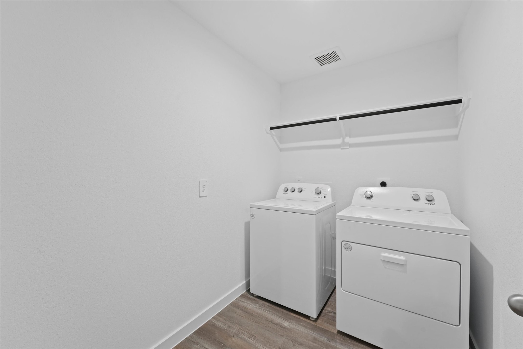 1115 Briscoe Court Rosharon, TX 77583 - Photo 14 of 16 a view of storage and utility room with washer and dryer