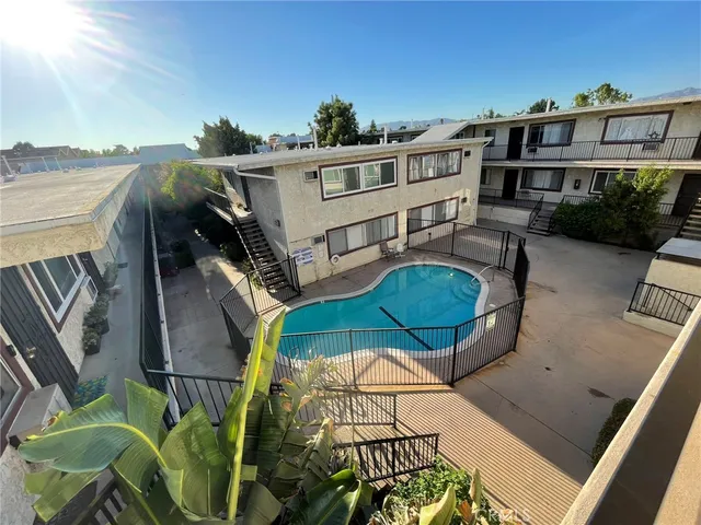a view of a balcony with chairs