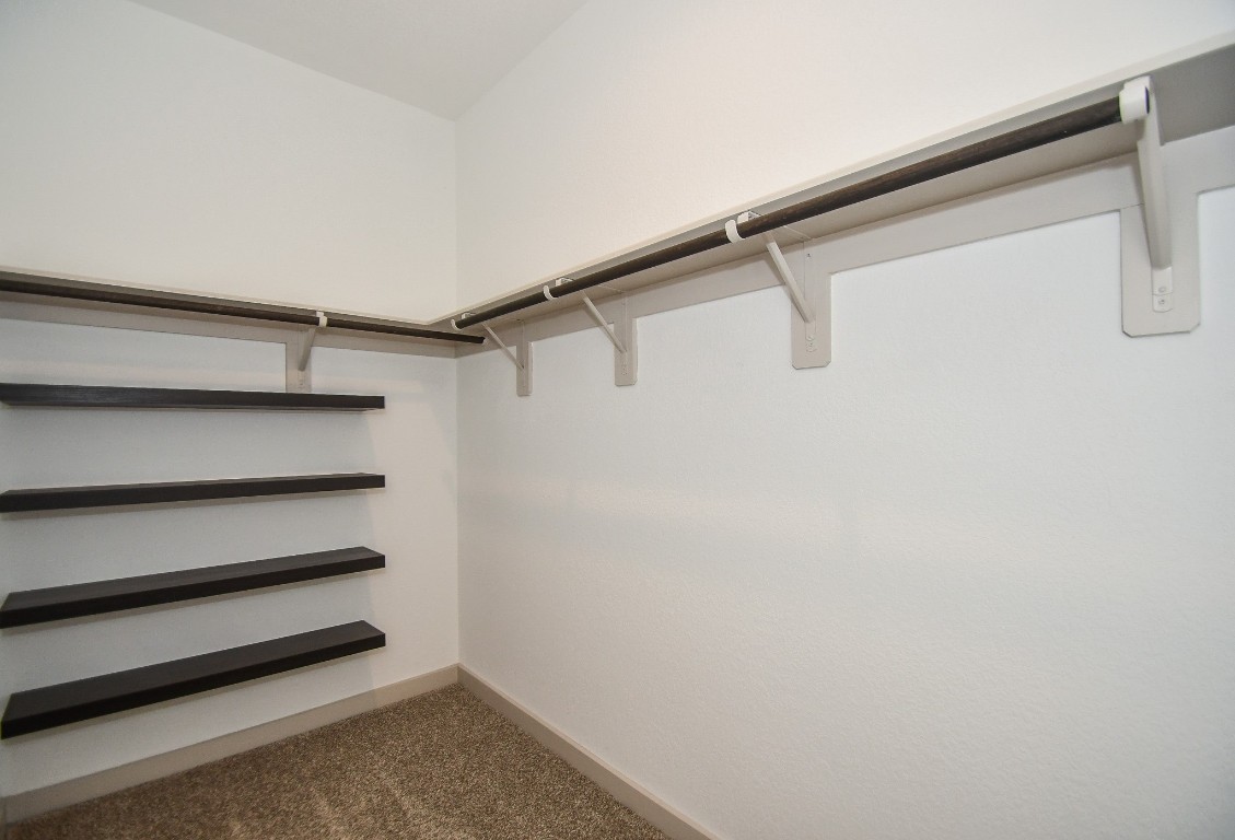 8034 House Bank Lane Rosharon, TX 77583 - Photo 20 of 32 One of two primary bedroom closet, built in storage