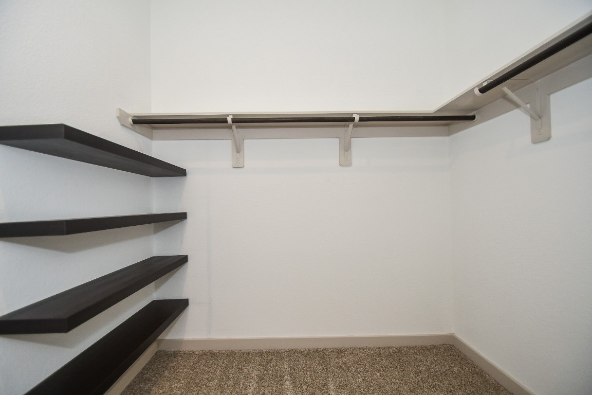 8034 House Bank Lane Rosharon, TX 77583 - Photo 21 of 32 One of two primary bedroom closet, built in storage