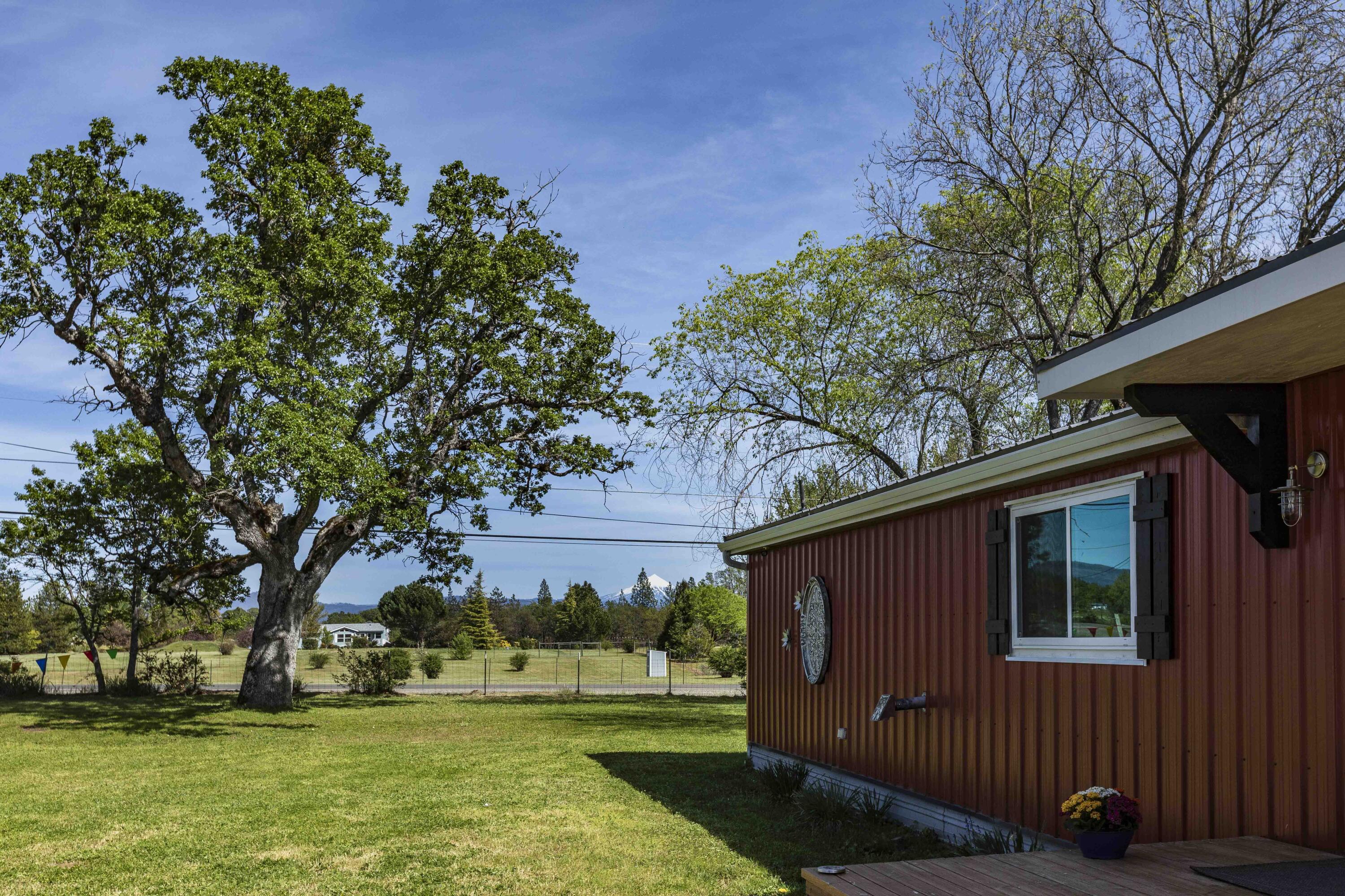 5225 Dodge Road White City, OR 97503 - Photo 40 of 49 a view of a backyard with large trees