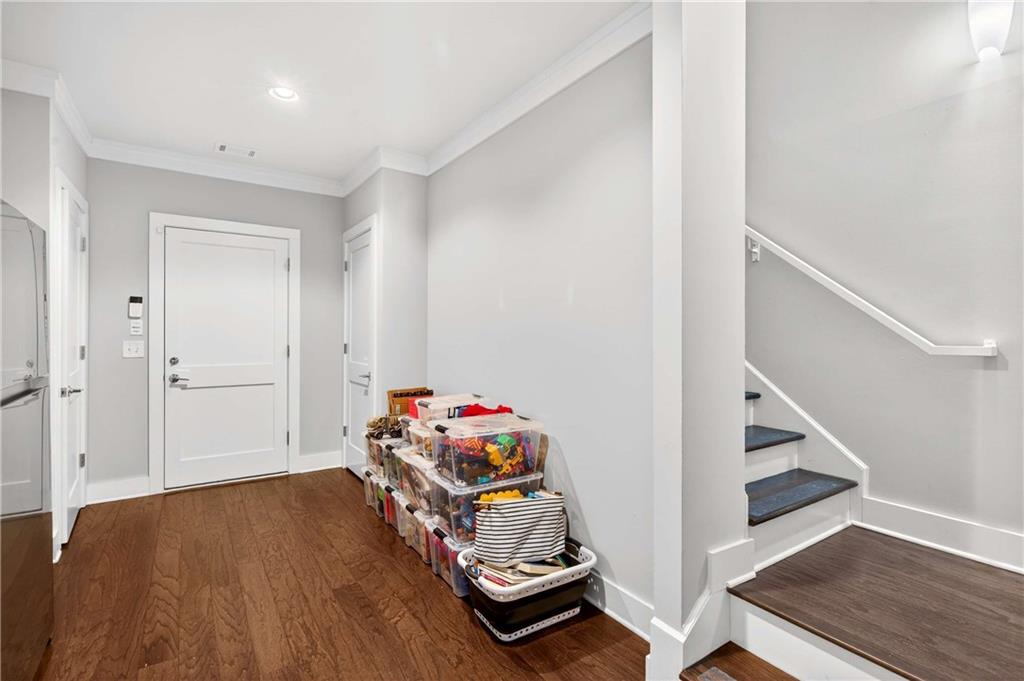 2974 Hermance Drive Northeast Atlanta, GA 30319 - Photo 31 of 38 a room with furniture and wooden floor