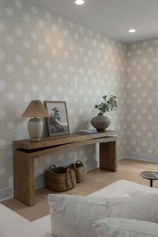 a kitchen with a sink and lots of wooden cabinets