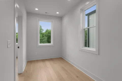 an empty room with windows