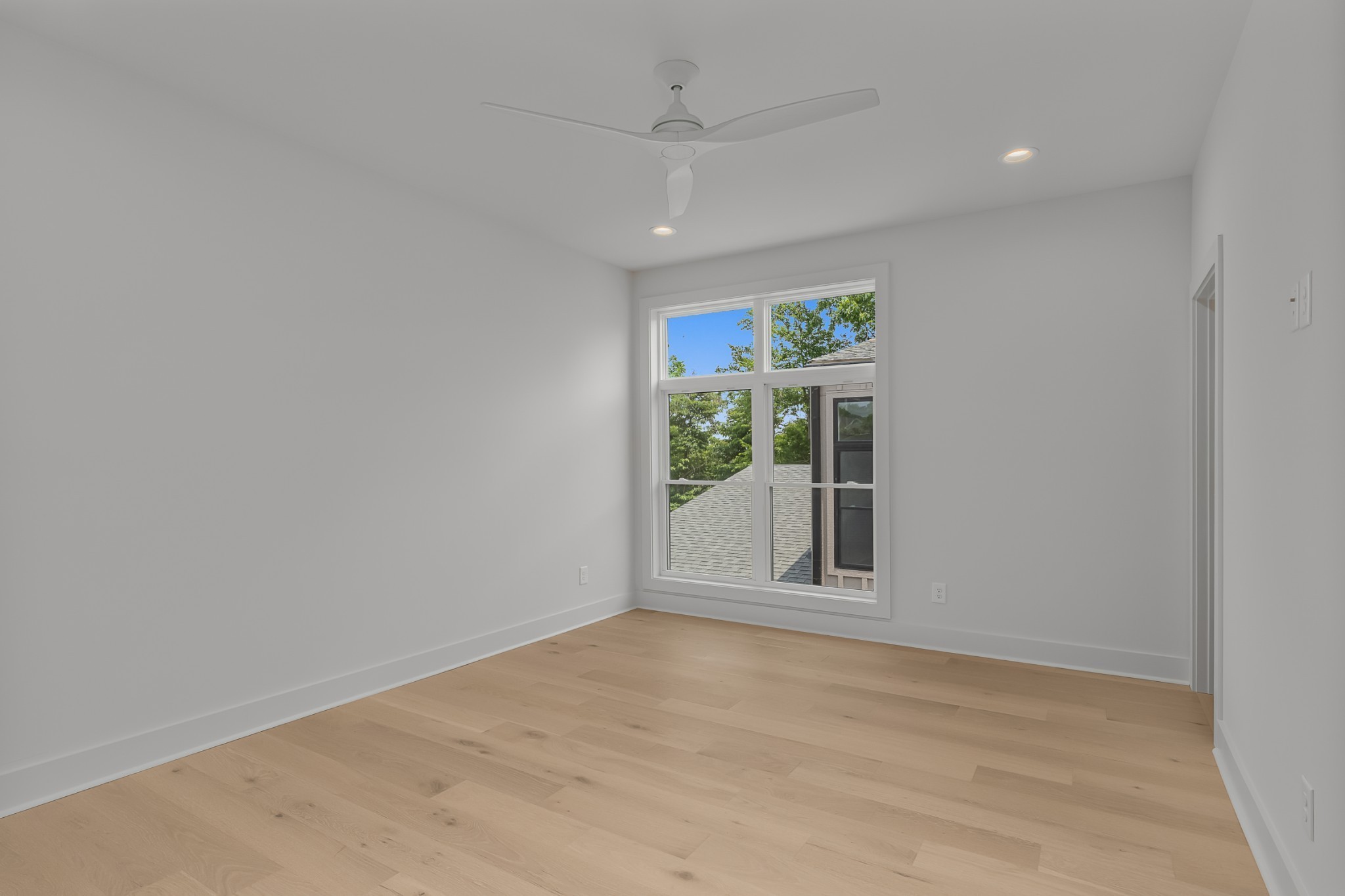 2305 Eastland Avenue, Unit K Nashville, TN 37206 - Photo 28 of 44 an empty room with windows and closet