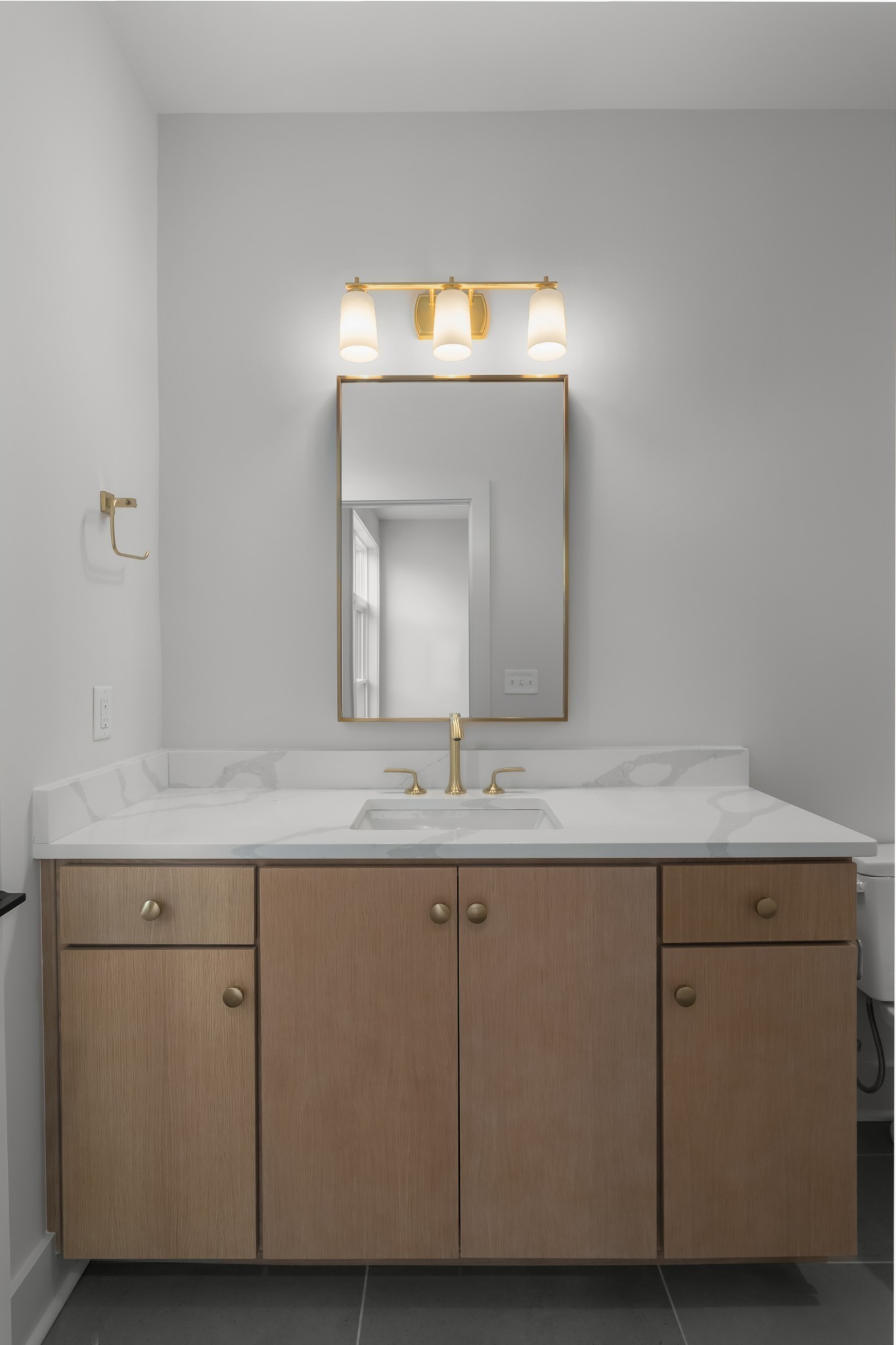 2305 Eastland Avenue, Unit K Nashville, TN 37206 - Photo 30 of 44 a bathroom with a sink and a mirror