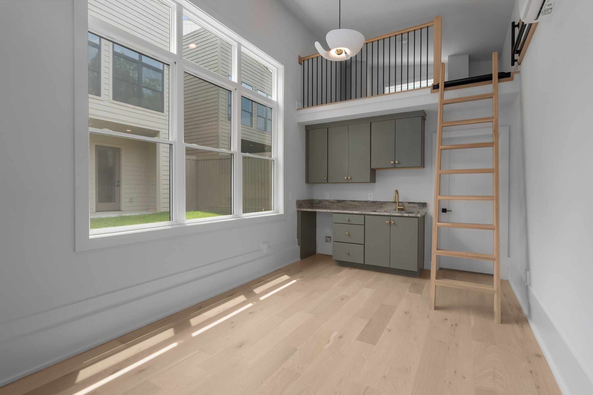 2305 Eastland Avenue, Unit K Nashville, TN 37206 - Photo 37 of 44 a view of kitchen with cabinets and window