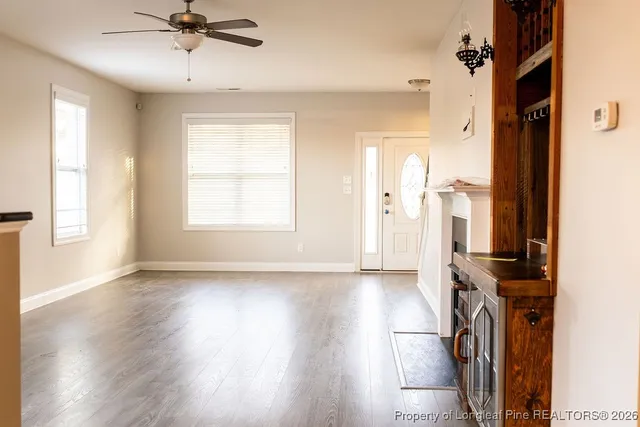 a view of a kitchen with a sink dishwasher and a window