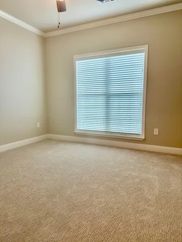 an empty room with a empty space and window
