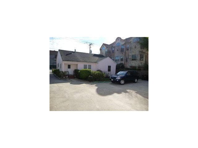 516 Second Street Scotts Valley, CA 95060 - Photo 2 of 5 a black and white photo of a living room