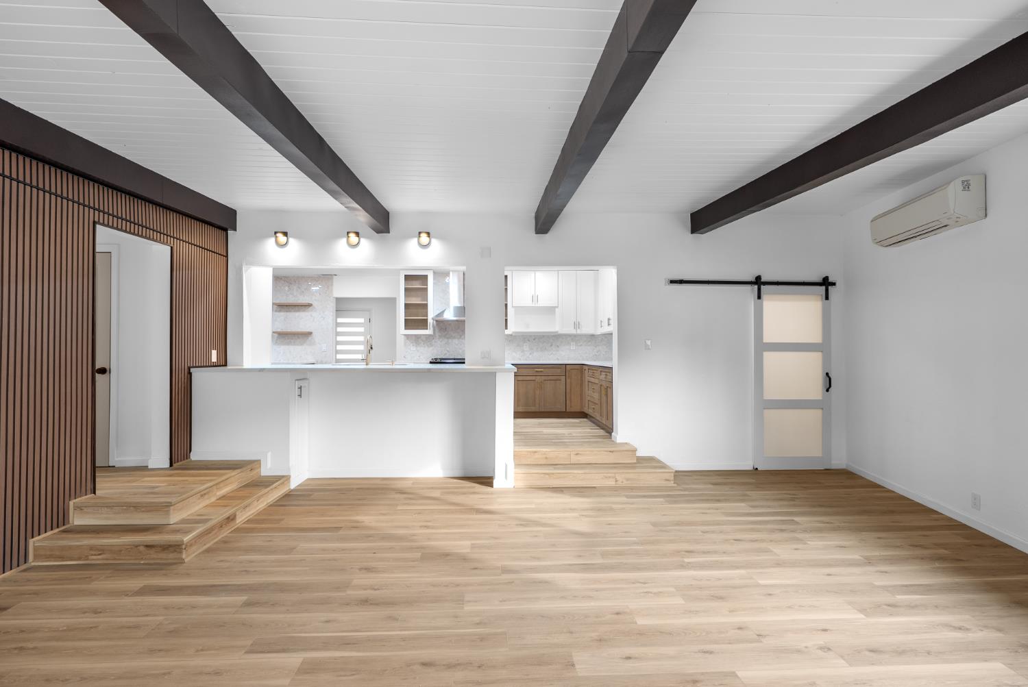 1125 Wellesley Avenue Modesto, CA 95350 - Photo 8 of 43 a view of a kitchen with wooden floor and a kitchen