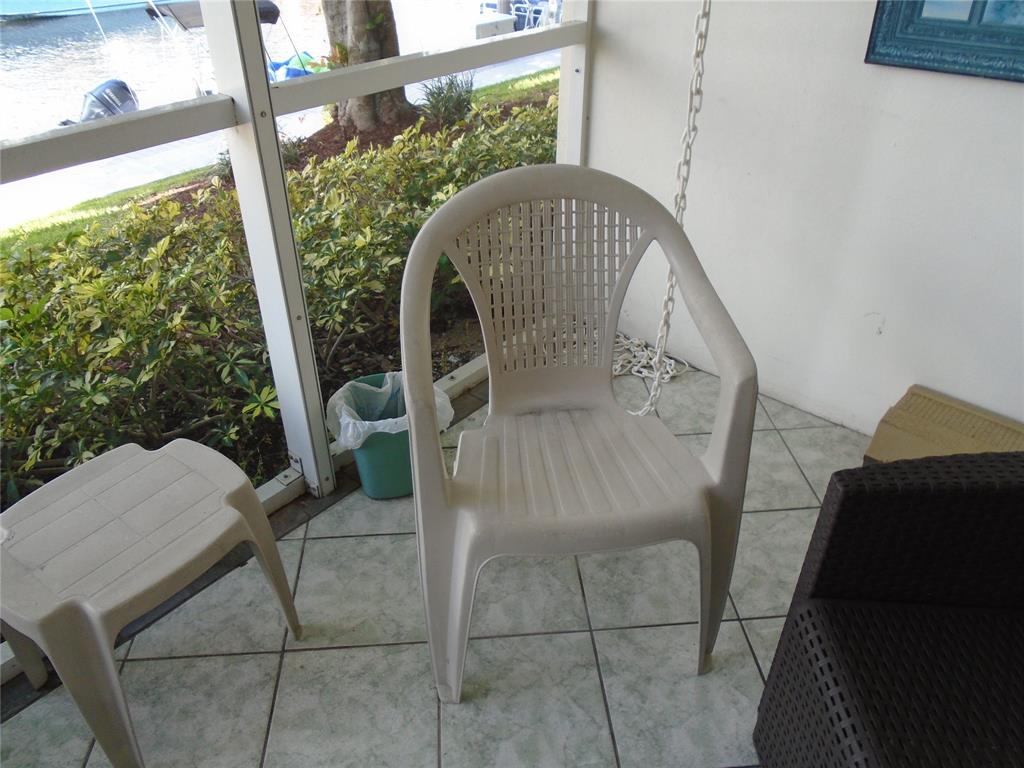 3165 Northeast 48th Court, Unit 110 Lighthouse Point, FL 33064 - Photo 12 of 49 a view of balcony with furniture