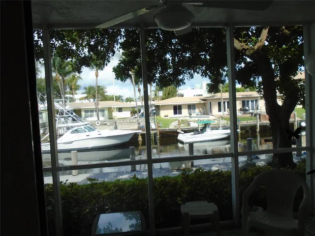 a view of water fountain from a balcony