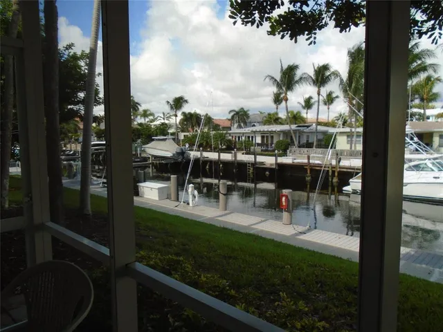 a kitchen with stainless steel appliances granite countertop a sink and a stove
