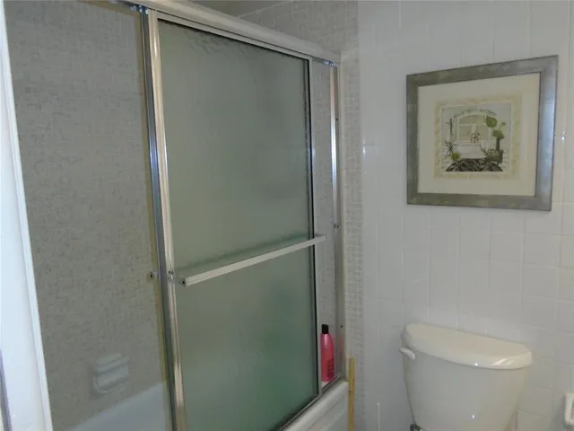 a bathroom with a sink a mirror and vanity