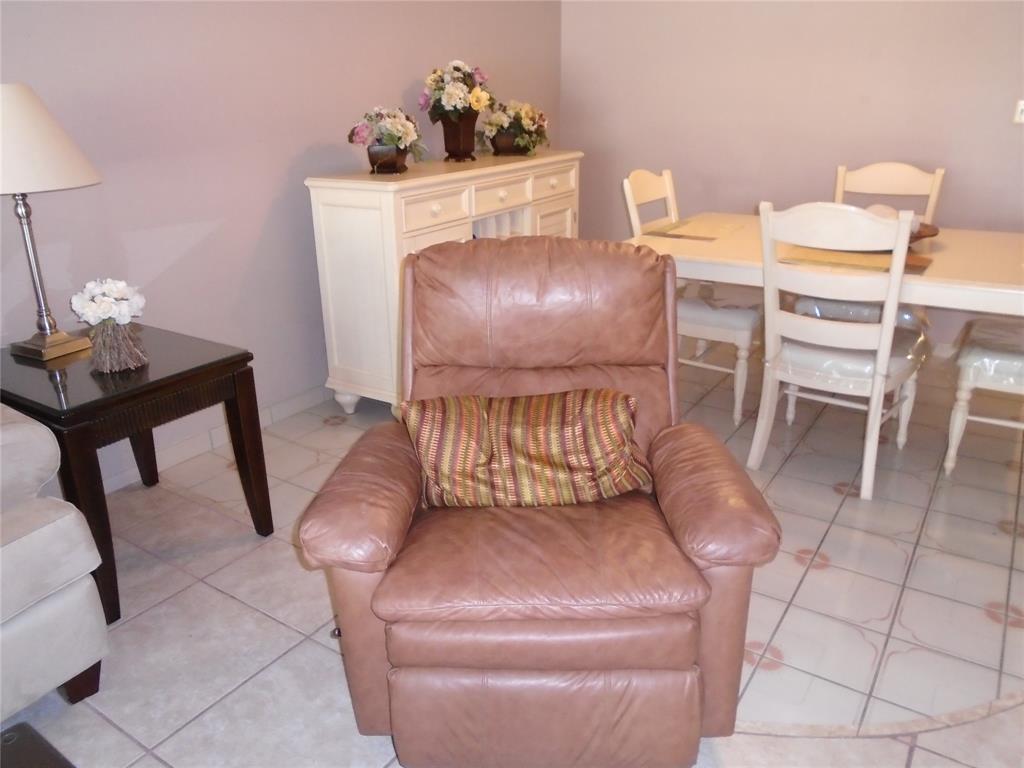 3165 Northeast 48th Court, Unit 110 Lighthouse Point, FL 33064 - Photo 7 of 49 a living room with furniture