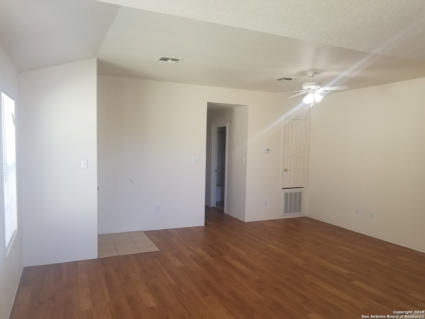 11207 Terra Loop Road San Antonio, TX 78233 - Photo 1 of 7 wooden floor in an empty room
