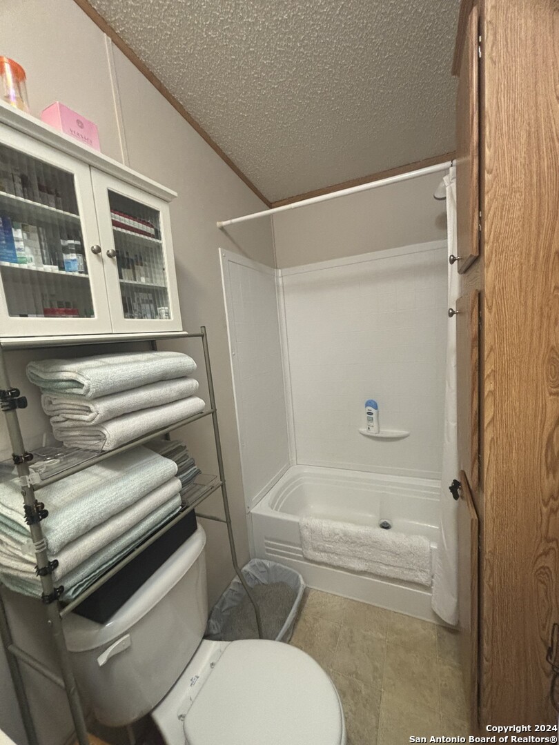 7971 Pronghorn Drive Spring Branch, TX 78070 - Photo 22 of 53 a bathroom with a toilet and a shower