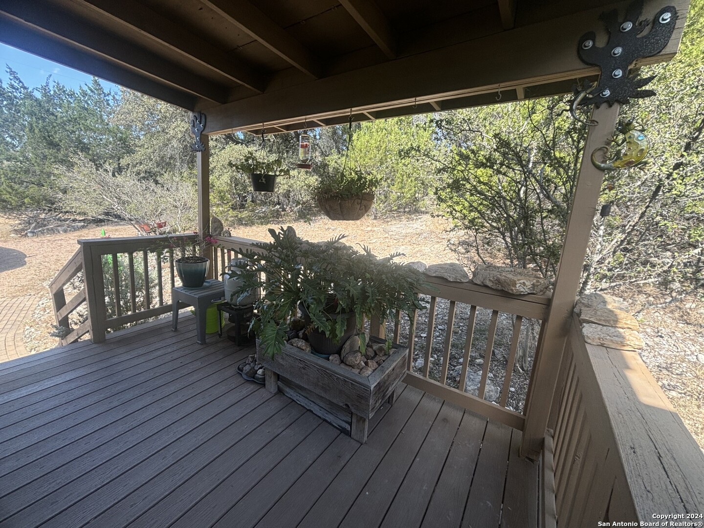 7971 Pronghorn Drive Spring Branch, TX 78070 - Photo 29 of 53 a view of a two chairs in the balcony