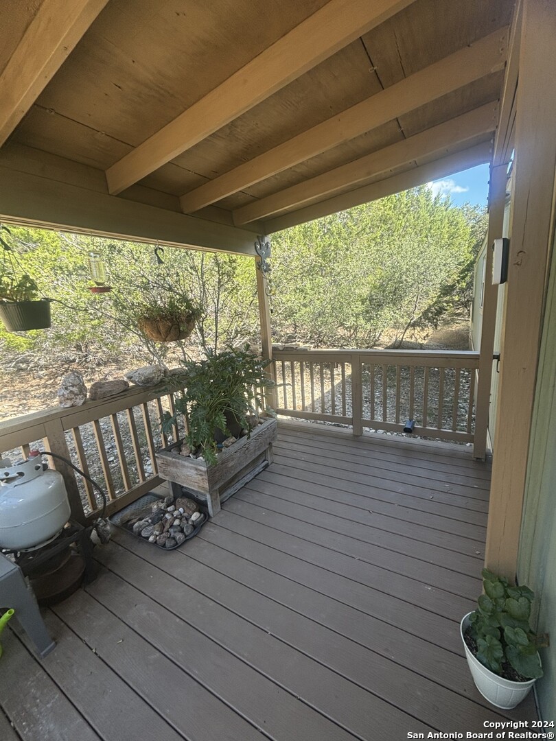 7971 Pronghorn Drive Spring Branch, TX 78070 - Photo 30 of 53 a view of a two chairs in the balcony