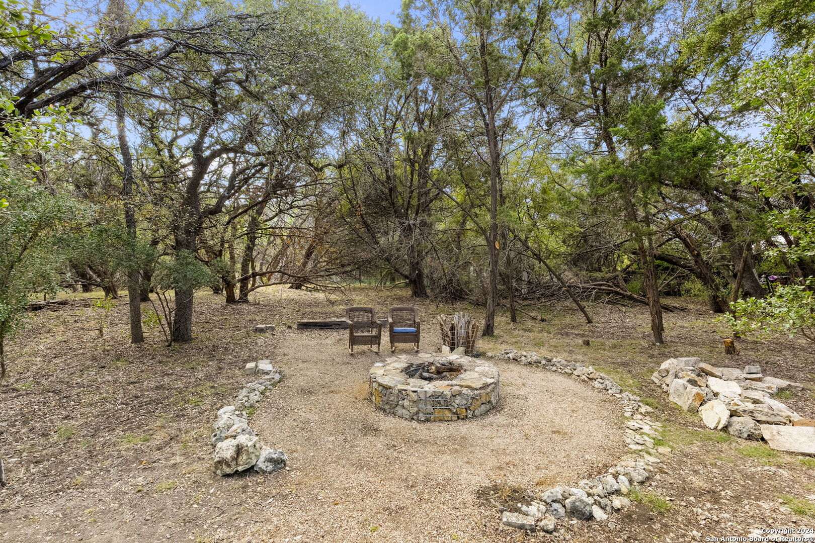 7971 Pronghorn Drive Spring Branch, TX 78070 - Photo 31 of 53 a view of a yard with a tree