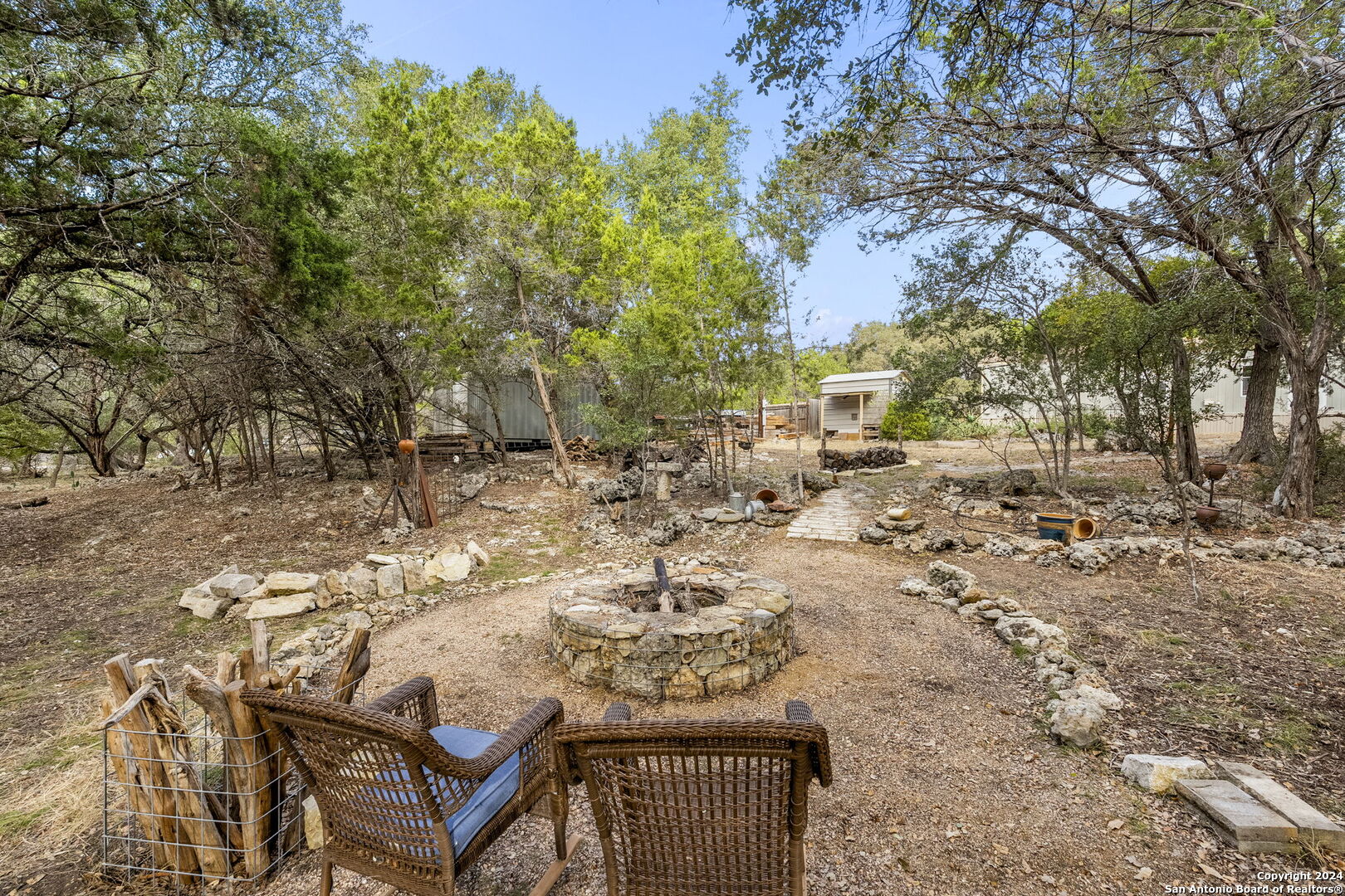 7971 Pronghorn Drive Spring Branch, TX 78070 - Photo 8 of 53 a view of a yard with chairs