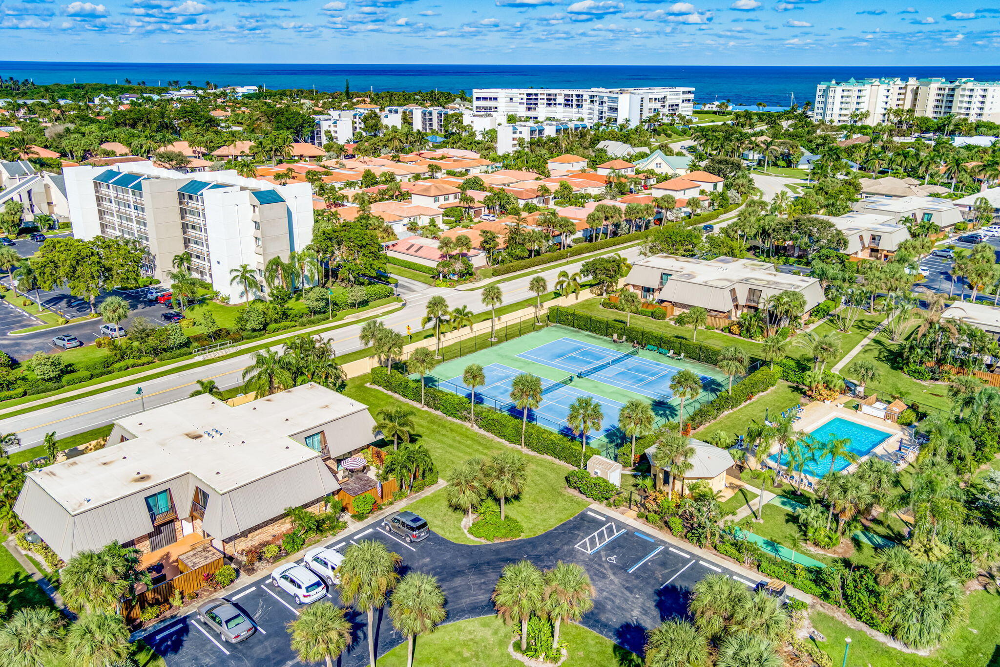 1420 Ocean Way, Unit 23C Jupiter, FL 33477 - Photo 19 of 32 an aerial view of a house with a garden