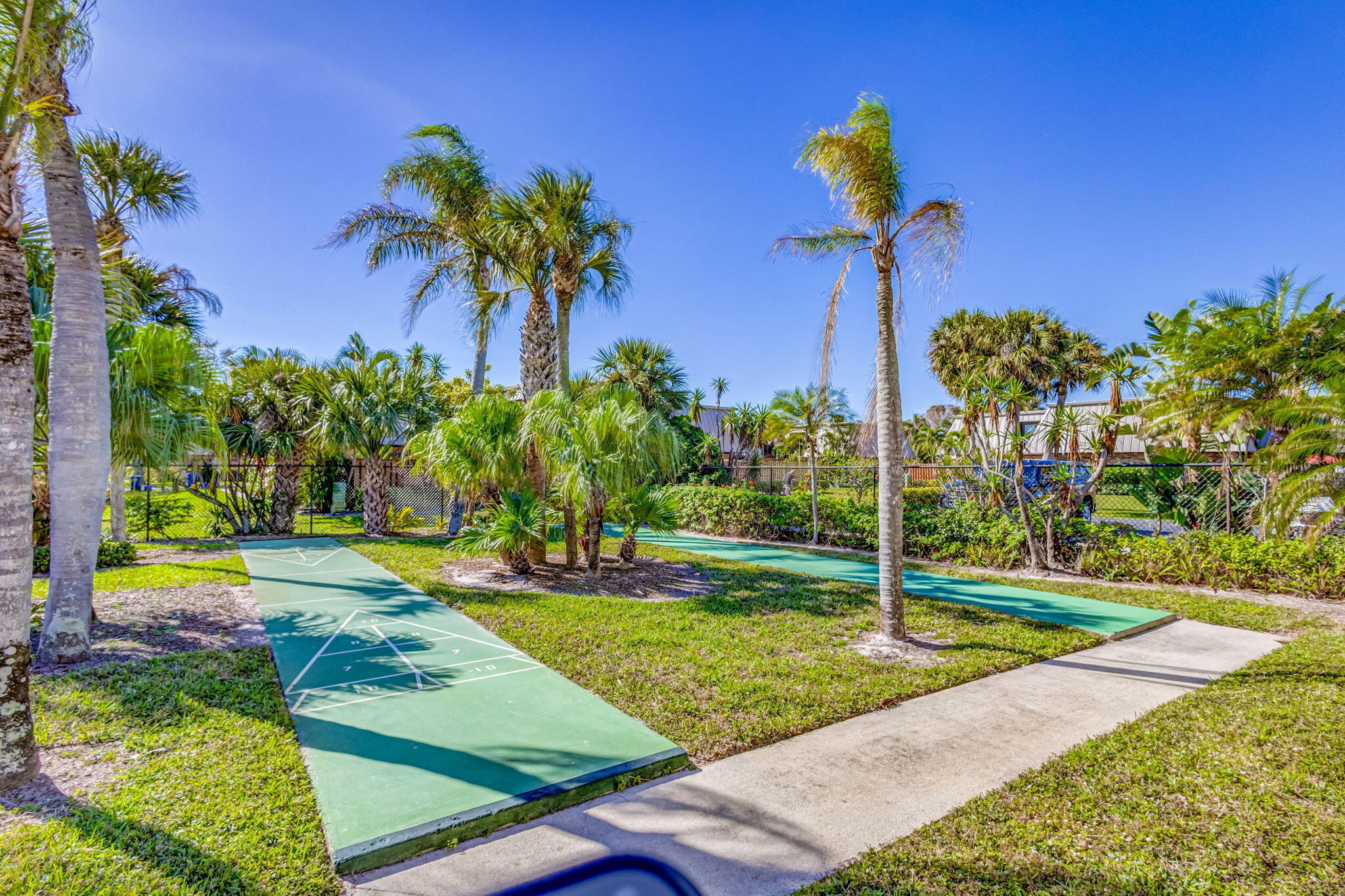 1420 Ocean Way, Unit 23C Jupiter, FL 33477 - Photo 26 of 32 a view of a yard with plants