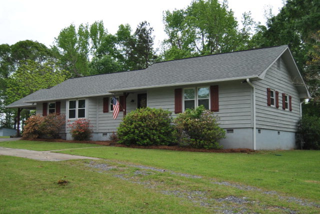 6298 Thomaston Road Macon, GA 31220 - Photo 1 of 33 a view of a house with backyard and garden