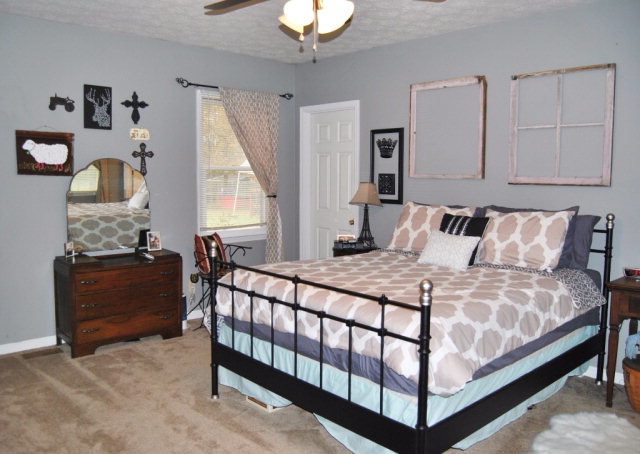 6298 Thomaston Road Macon, GA 31220 - Photo 13 of 33 a bedroom with a bed and a chandelier