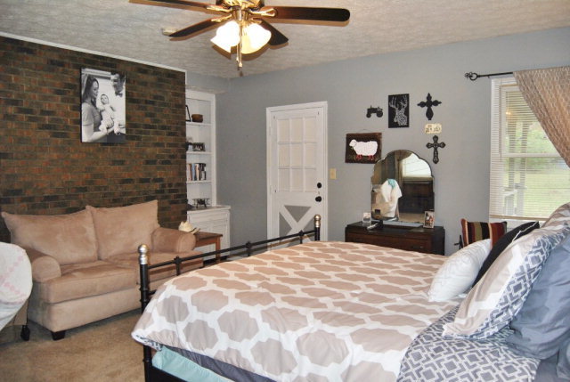 6298 Thomaston Road Macon, GA 31220 - Photo 17 of 33 a bedroom with a bed and ceiling fan