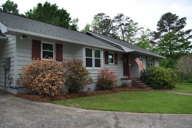 6298 Thomaston Road Macon, GA 31220 - Photo 3 of 33 a view of a house with a garden