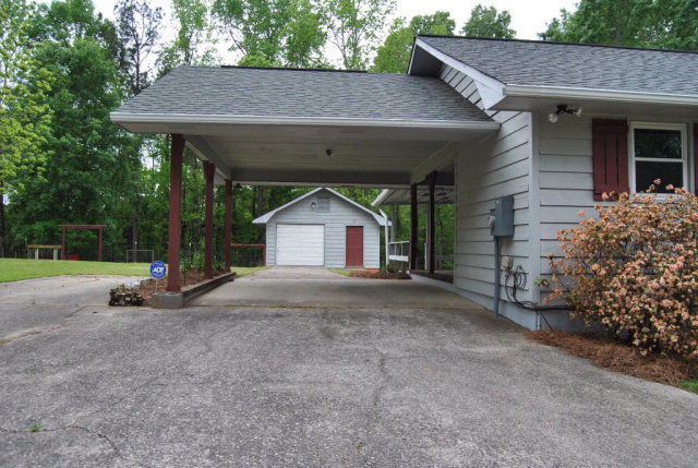 6298 Thomaston Road Macon, GA 31220 - Photo 33 of 33 a view of a house with a yard and tree