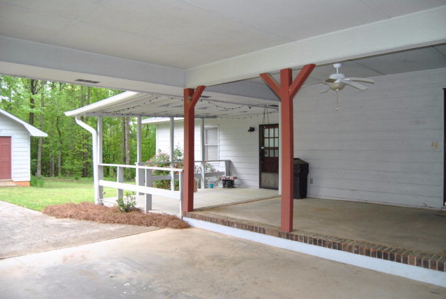 6298 Thomaston Road Macon, GA 31220 - Photo 6 of 33 a house with yard in front of it