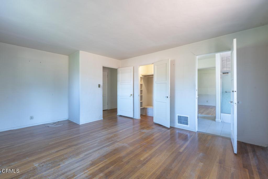 893 Gainsborough Drive Pasadena, CA 91107 - Photo 22 of 62 a view of an empty room with wooden floor