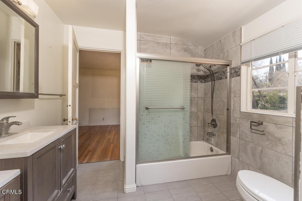 893 Gainsborough Drive Pasadena, CA 91107 - Photo 23 of 62 a bathroom with a sink toilet and shower