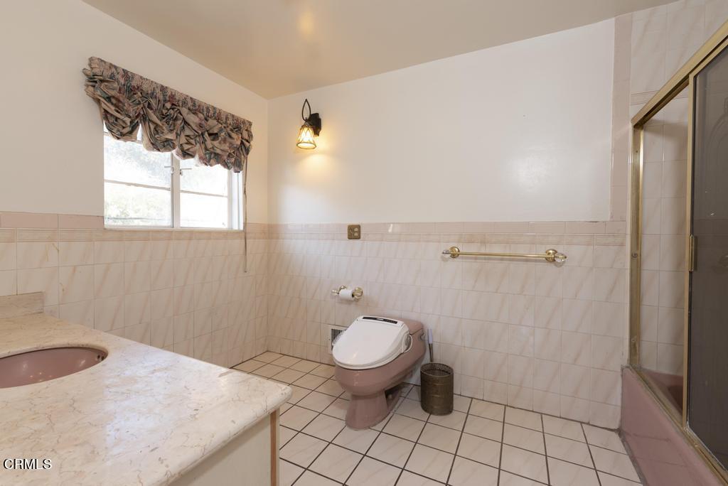 893 Gainsborough Drive Pasadena, CA 91107 - Photo 29 of 62 a bathroom with a granite countertop sink toilet and shower