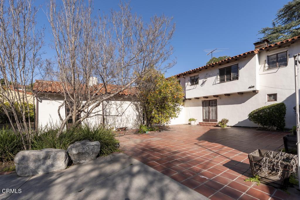 893 Gainsborough Drive Pasadena, CA 91107 - Photo 38 of 62 a front view of a house with a yard