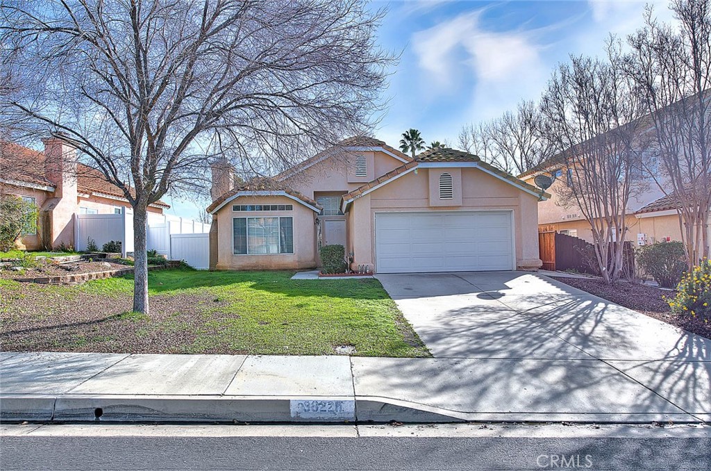 39220 Cala Del Valle Murrieta, CA 92562 - Photo 1 of 47 a front view of a house with a yard and garage