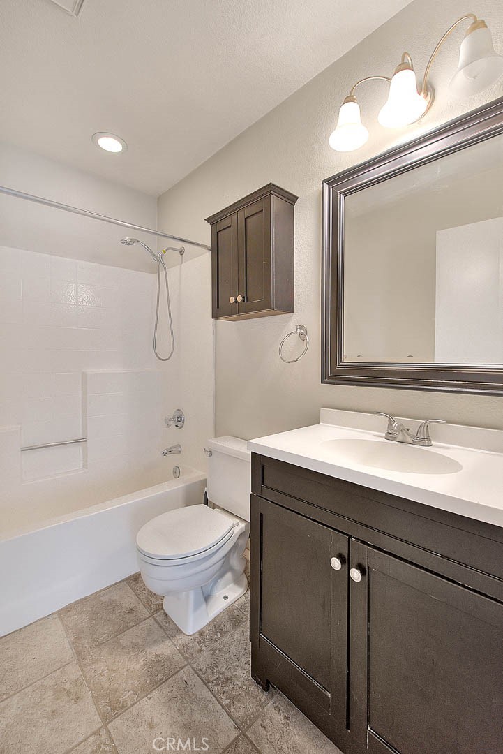 39220 Cala Del Valle Murrieta, CA 92562 - Photo 19 of 47 a bathroom with a sink toilet and shower