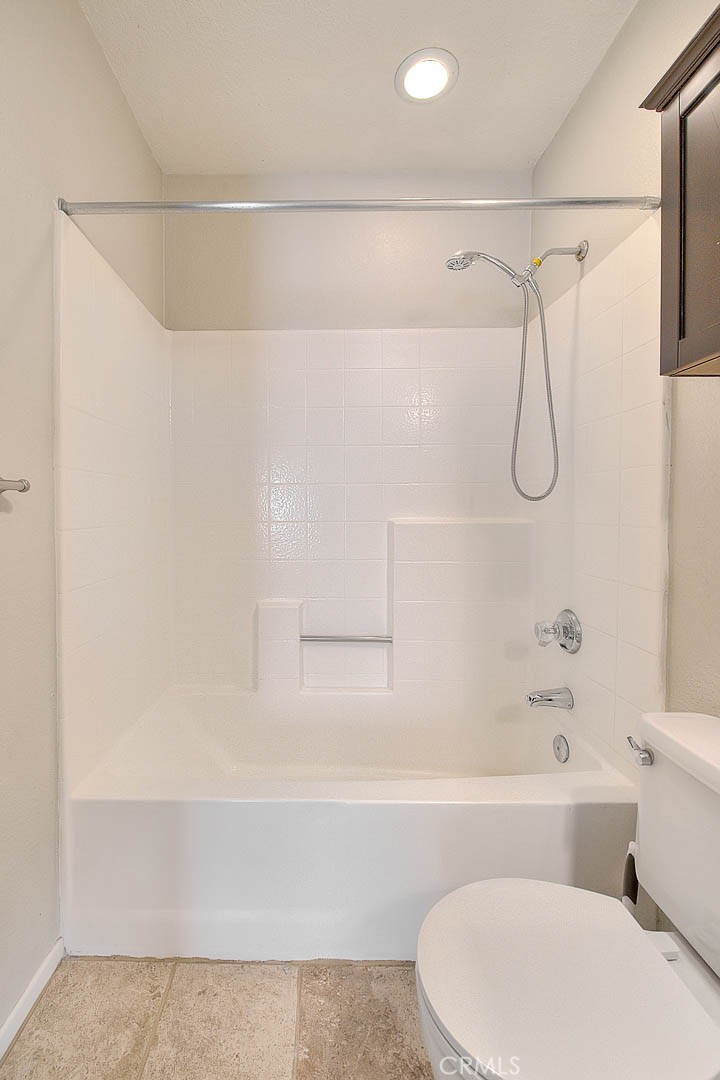 39220 Cala Del Valle Murrieta, CA 92562 - Photo 20 of 47 a bathroom with a bathtub and shower