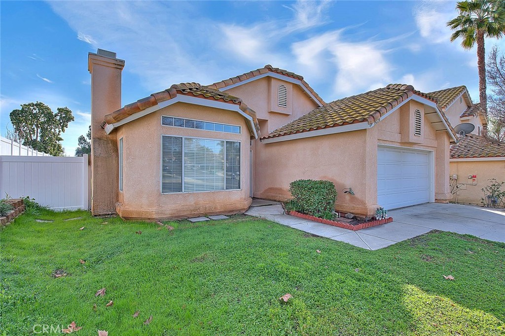 39220 Cala Del Valle Murrieta, CA 92562 - Photo 2 of 47 a front view of a house with a yard
