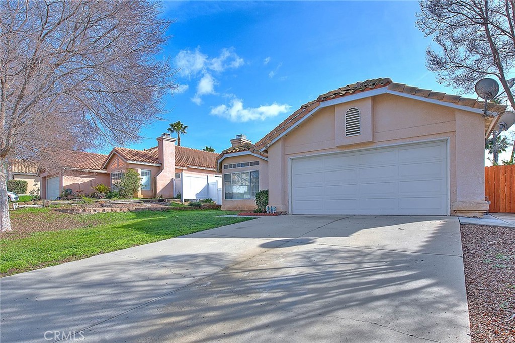 39220 Cala Del Valle Murrieta, CA 92562 - Photo 3 of 47 a view of a house with a yard