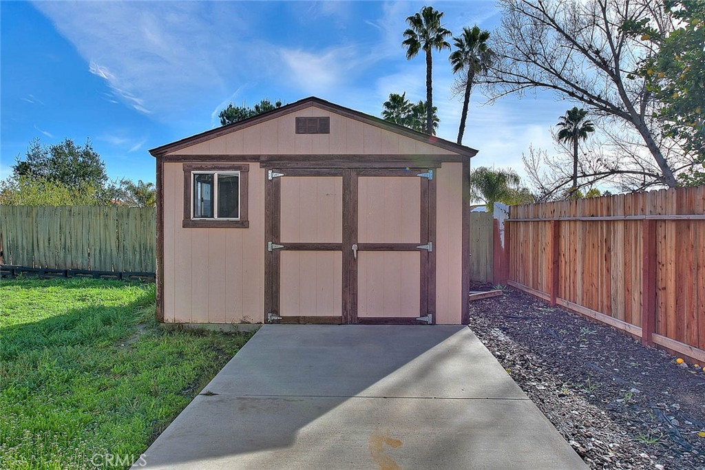 39220 Cala Del Valle Murrieta, CA 92562 - Photo 33 of 47 a front view of a house with a yard