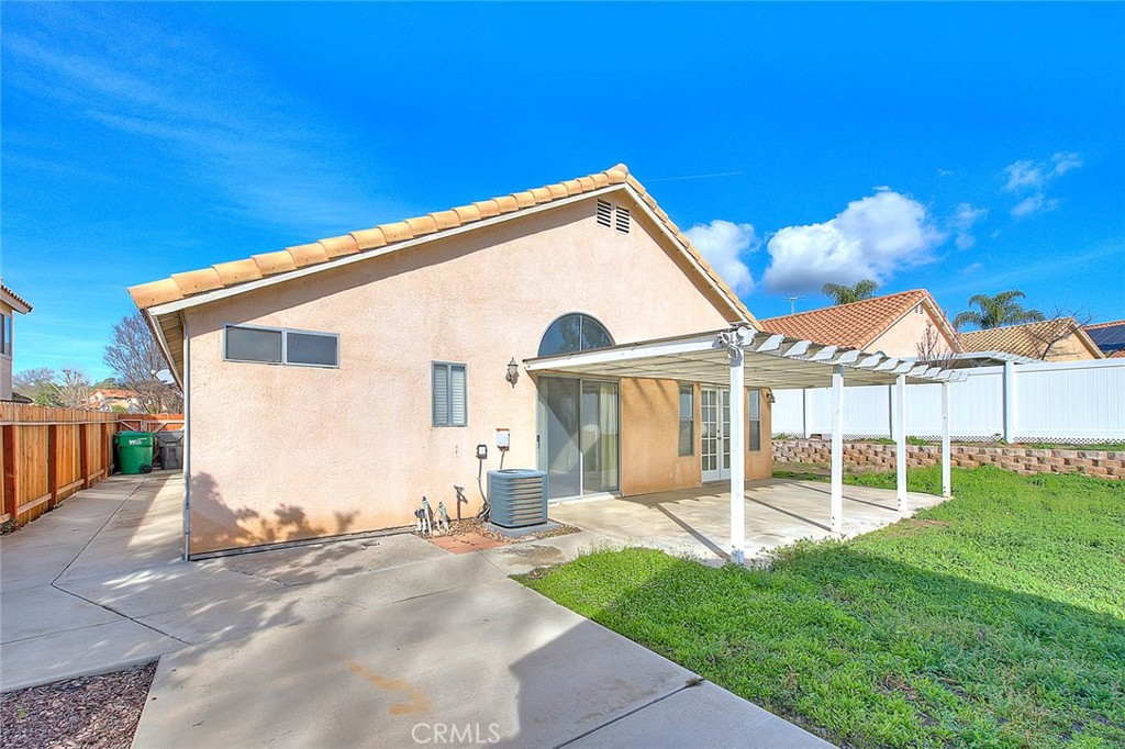39220 Cala Del Valle Murrieta, CA 92562 - Photo 35 of 47 a view of a house with a backyard