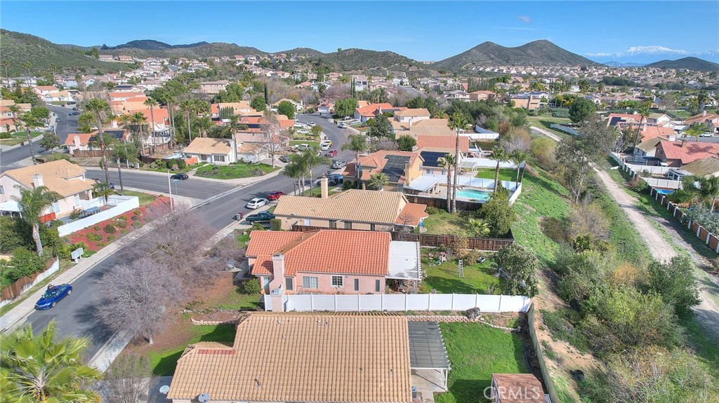 39220 Cala Del Valle Murrieta, CA 92562 - Photo 40 of 47 an aerial view of a house with a mountain