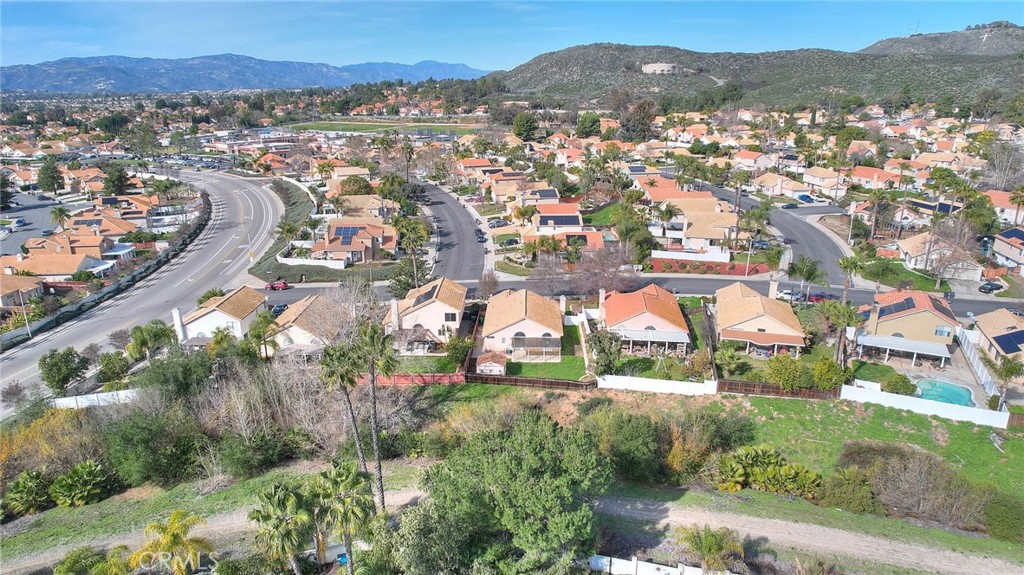 39220 Cala Del Valle Murrieta, CA 92562 - Photo 41 of 47 an aerial view of residential houses and outdoor space