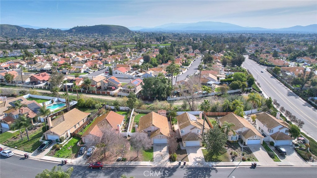 39220 Cala Del Valle Murrieta, CA 92562 - Photo 45 of 47 an aerial view of lake residential house with swimming pool and green space